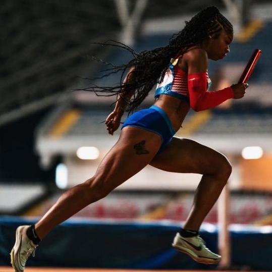 Kaila Jackson running in track meet