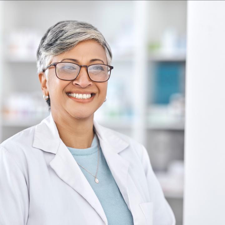 senior woman pharmacy worker and vision health