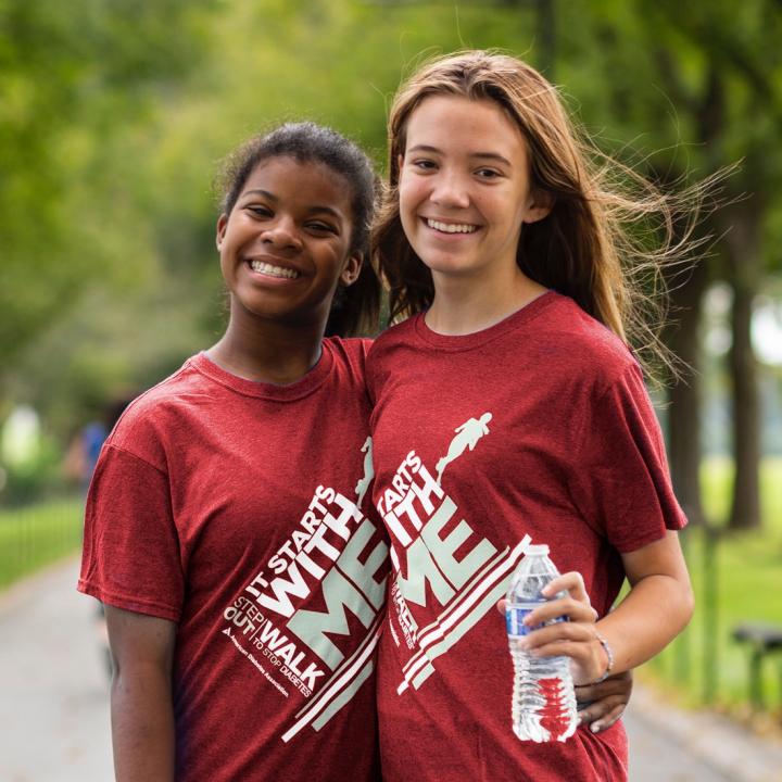 two girls smiling after Step Out Walk event