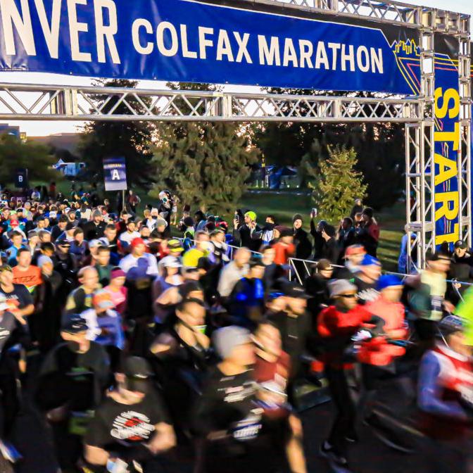 Runners starting denver colfax marathon