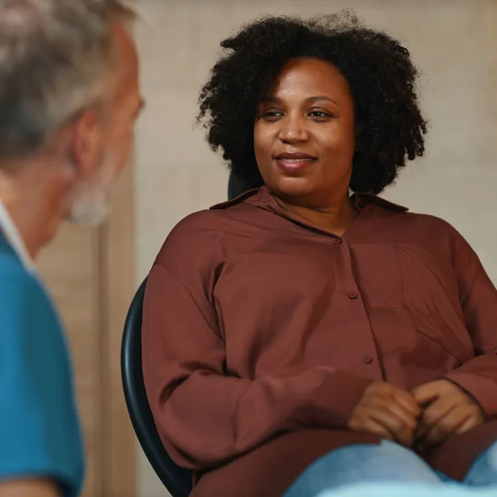 African American woman talking to doctor about preventing diabetes complications