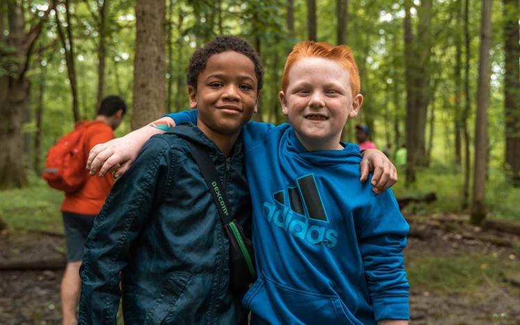 Two smiling young boys at diabetes camp