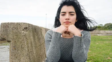 Teenage Latina girl looking sad