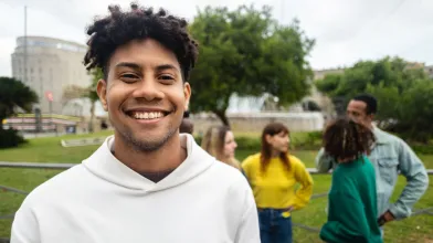 Smiling young Latino male