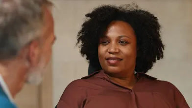 African American woman talking to doctor about preventing diabetes complications
