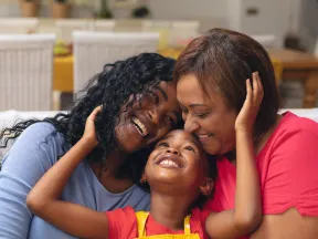 Happy family of a girl, mother, and grandmother