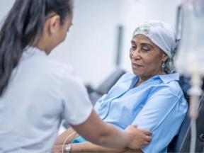 Woman receiving in-center dialysis