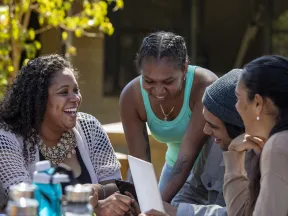 Smiling group of African American women and men