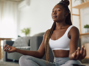 African American woman meditating