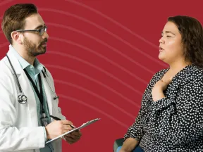 Doctor talking to overweight female patient