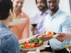 Group of people eating a healthy lunch