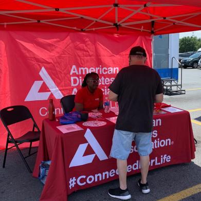 Volunteer at ADA booth