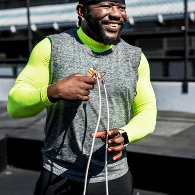 African American man exercising with jumprope