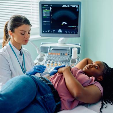 African American woman having ultrasound of her kidneys