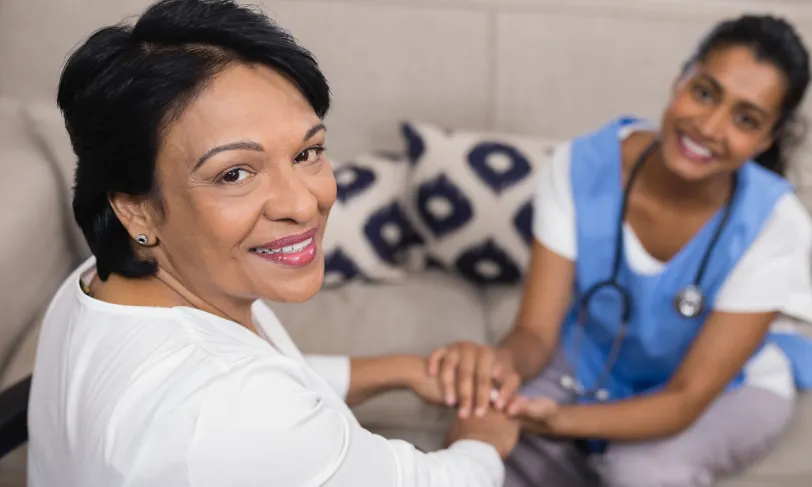 home health care worker comforting patient
