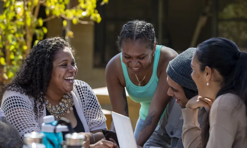 Smiling group of African American women and men