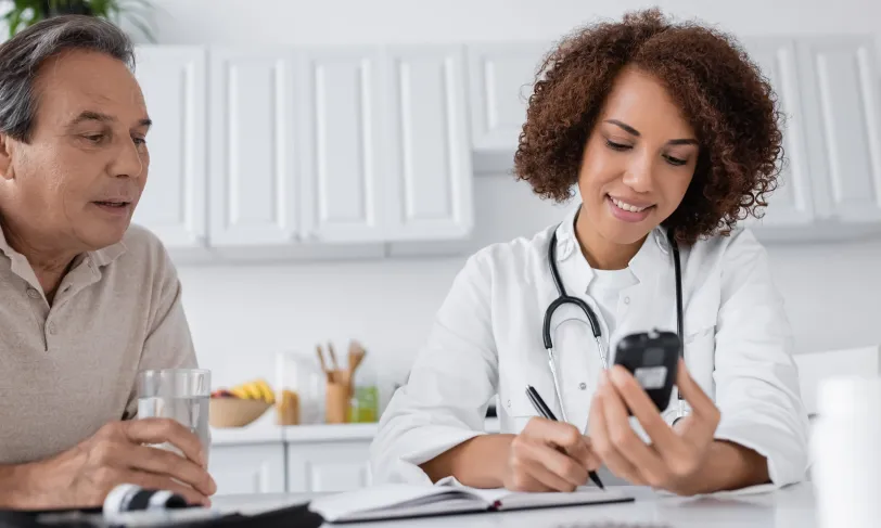 Senior patient discussing type 2 diabetes with doctor