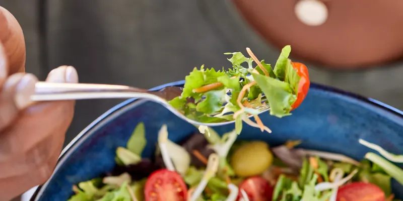 Woman eating a healthy salad
