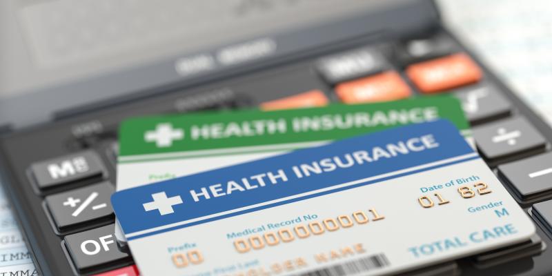 hero_medical-insurance-cards-on-the-calculator-health