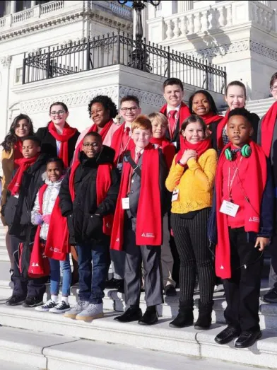 Families standing on the steps of the US Capitol