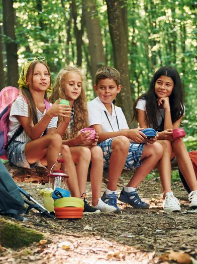 Four kids outdoors at diabetes camp