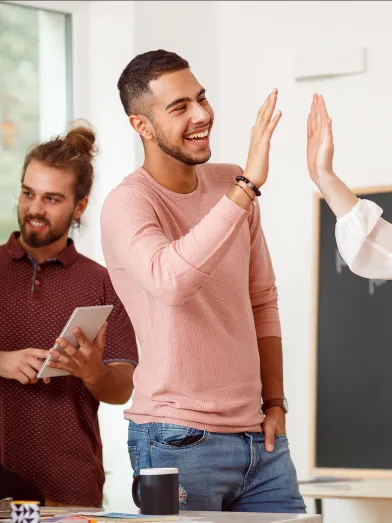 coworker giving high five