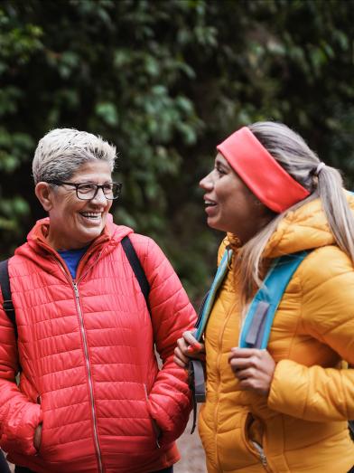 Multigenerational women hiking on fall day