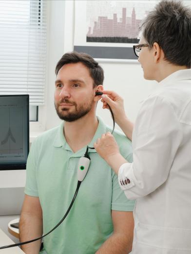 Man getting hearing checked