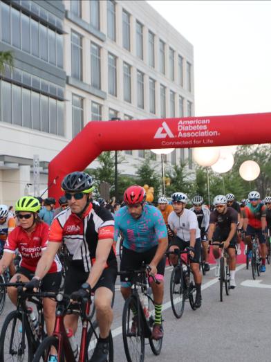 Large group of cyclists beginning ADA tour de cure bike ride