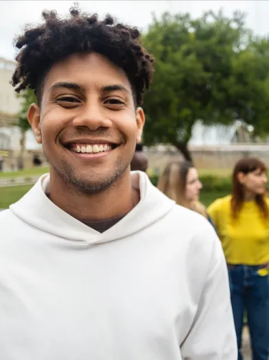 Smiling young Latino male